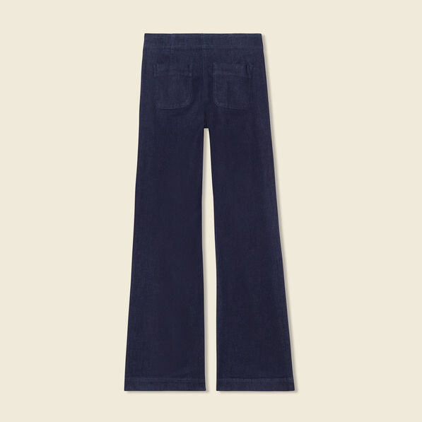 Jeans flare à pont denim brut femme