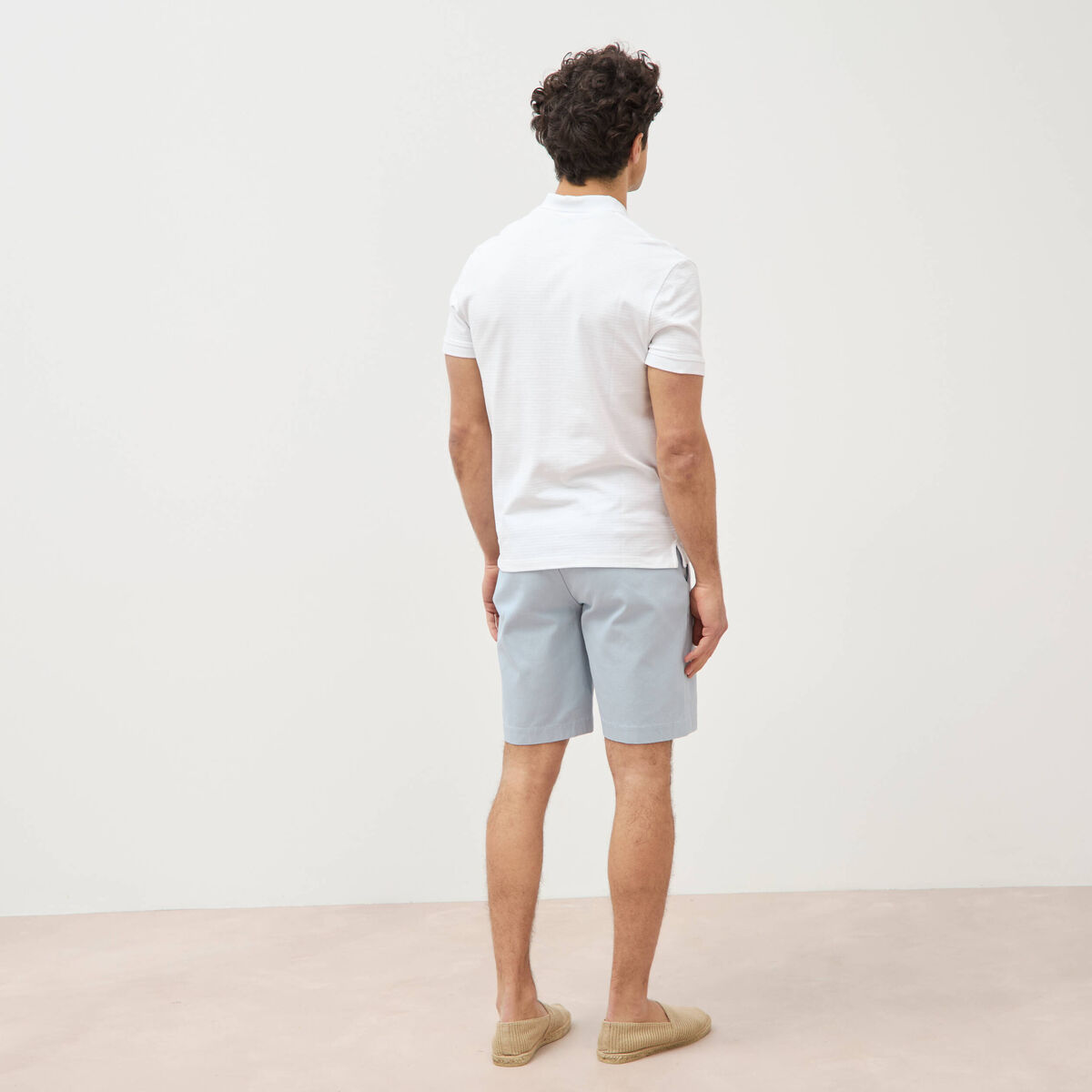 Polo cintr&eacute; en coton manches courtes blanc homme
