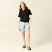 Polo en maille noir femme