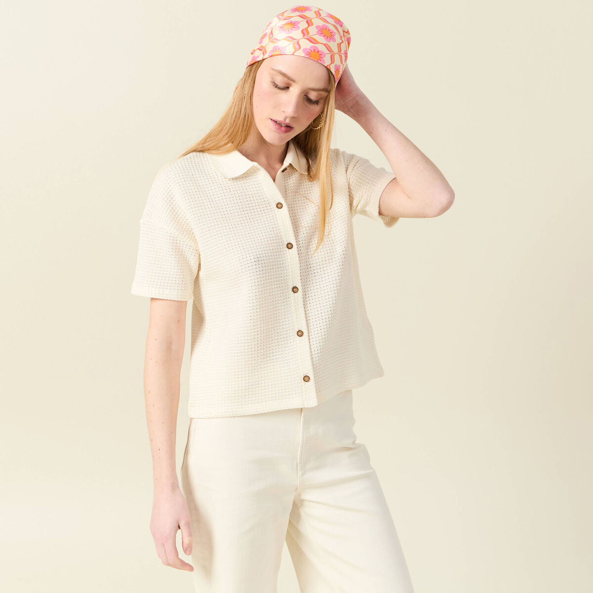Polo en maille creme femme
