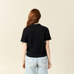 Polo en maille noir femme