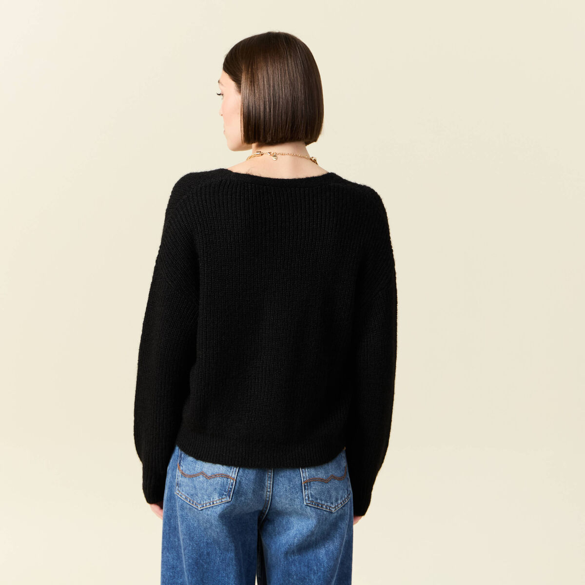 Gilet ajouré col V manches longues noir femme