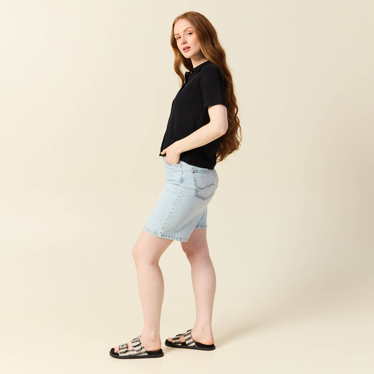 Polo en maille noir femme