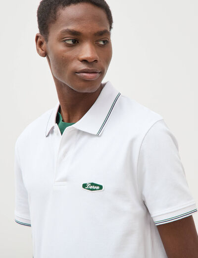 Polo cintr&eacute; en coton manches courtes blanc homme