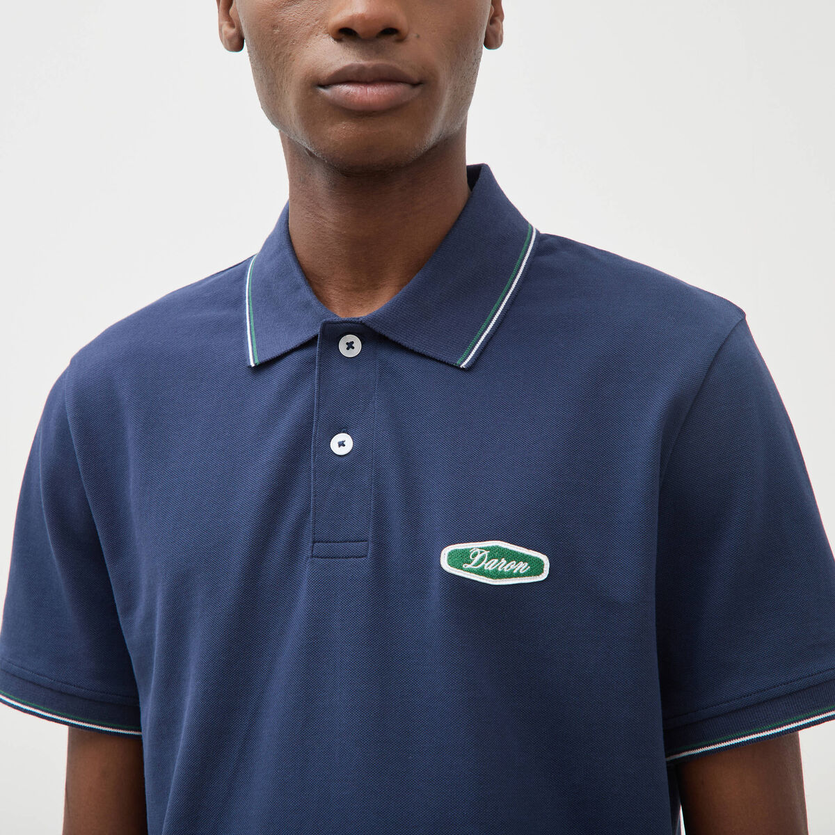 Polo cintr&eacute; en coton manches courtes bleu marine homme