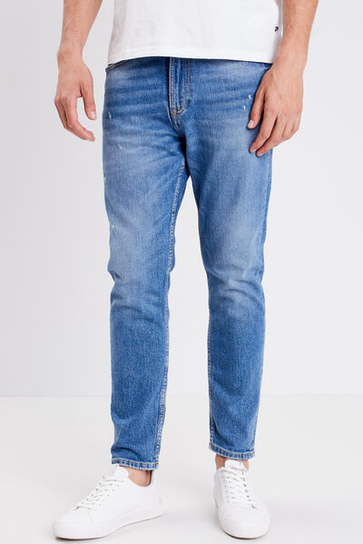 Jeans tapered détails destroy denim stone homme