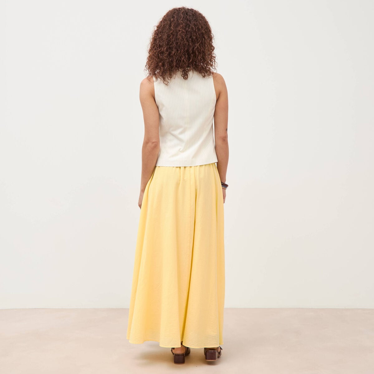 Gilet sans manches col rond doubl&eacute; ivoire femme