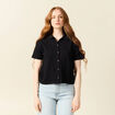 Polo en maille noir femme