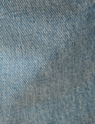 Jeans loose longueur 32 en coton denim dirty homme