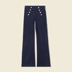 Jeans flare à pont denim brut femme