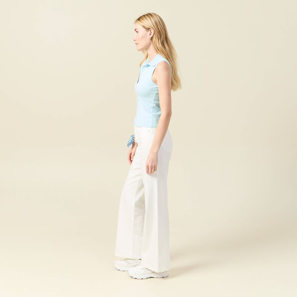 Polo sans manches bleu pastel femme