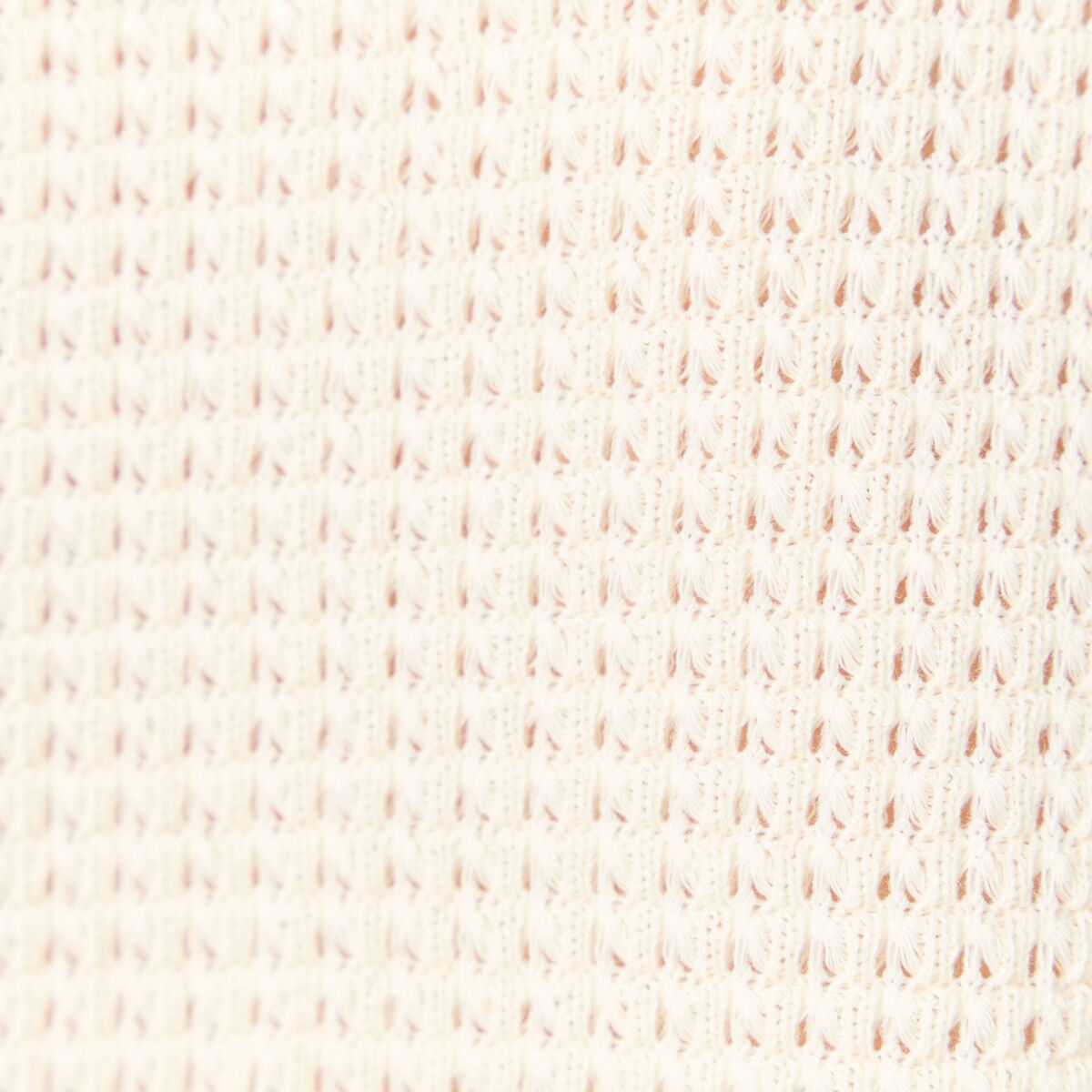 Polo en maille creme femme