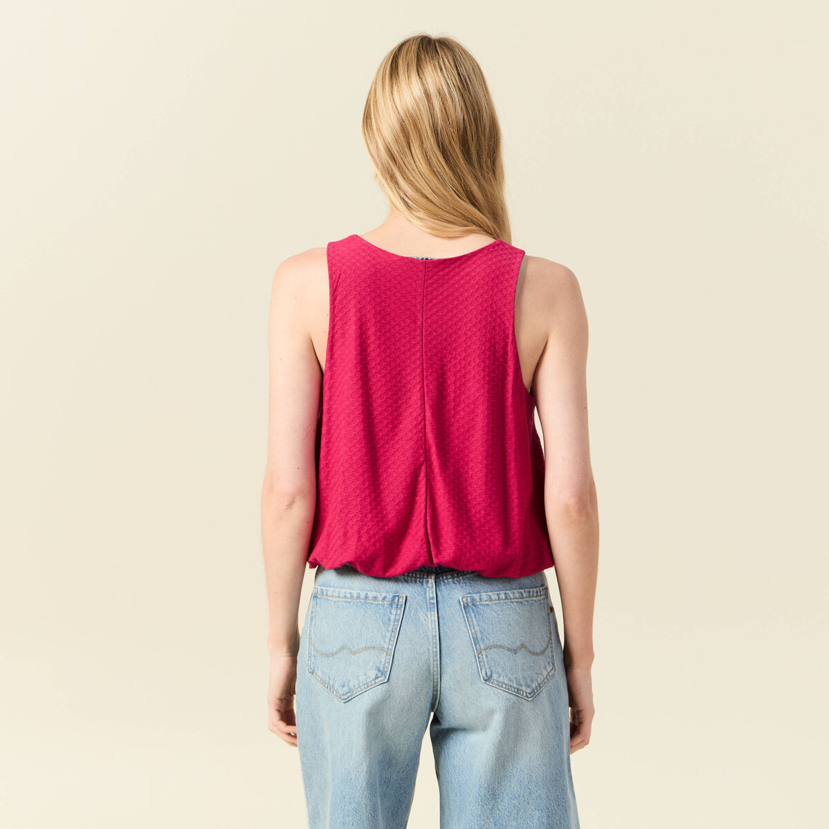 D&eacute;bardeur sans manches rose framboise femme