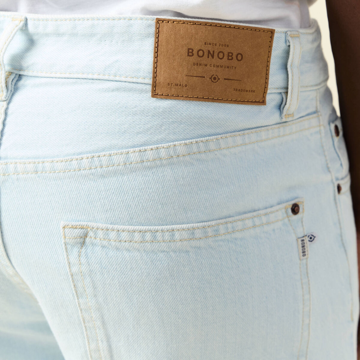 Jeans relax 5 poches denim bleach homme