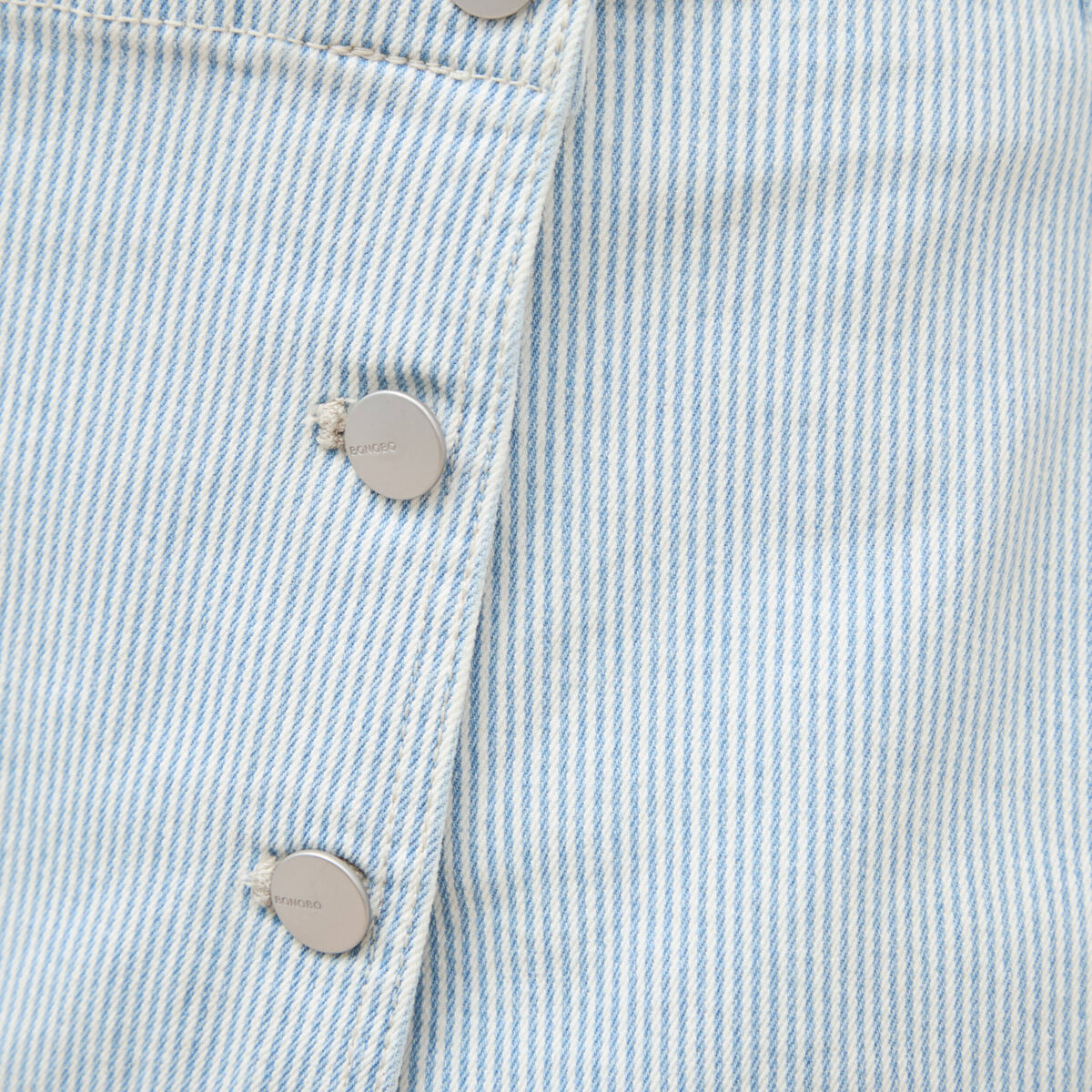 Jupe-short taille haute en jeans denim bleach femme