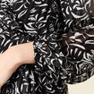 Robe évasée manches longues noir femme