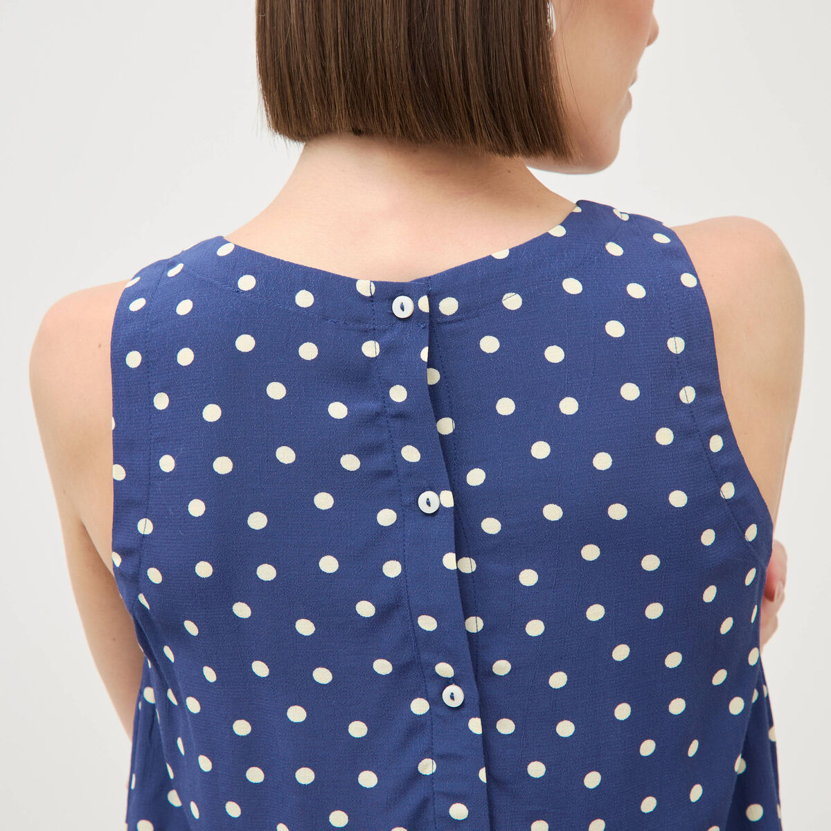 Top sans manches bleu marine femme