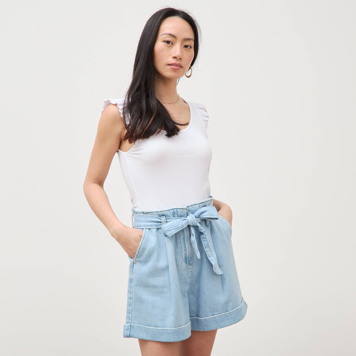 Short taille haute en jeans denim bleach femme