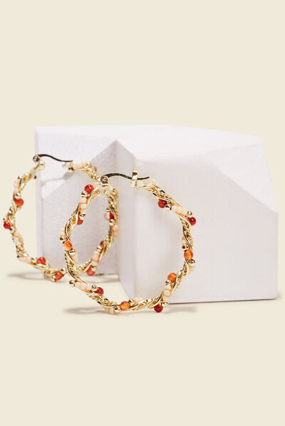 Boucles d'oreilles créoles rose clair femme