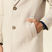 Manteau long boutonné beige homme