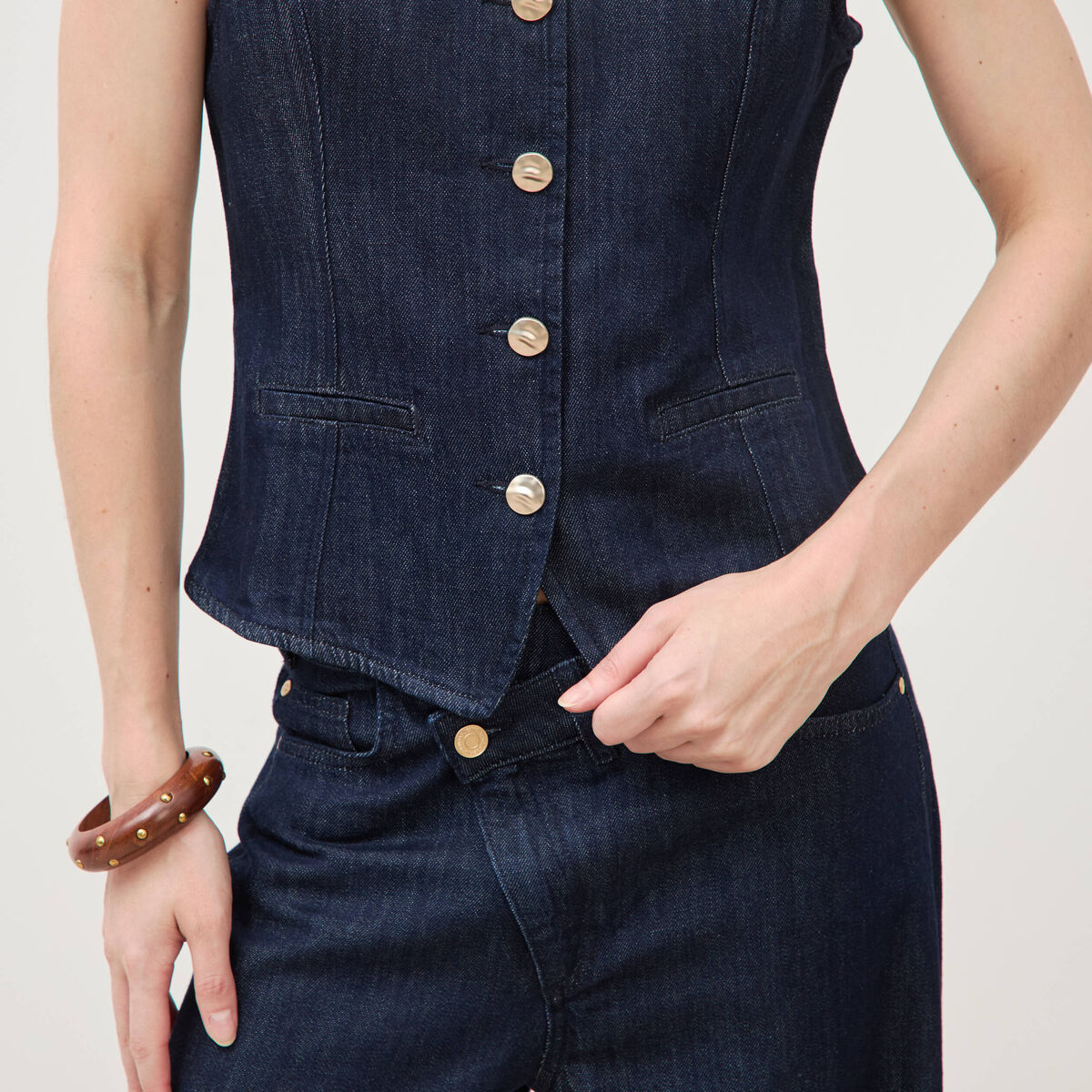 Gilet en jeans sans manches col rond denim brut femme