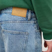 Jeans large longueur 34 en coton denim bleach homme