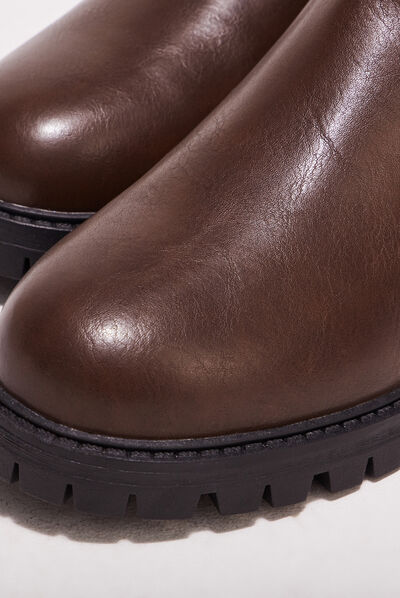 Bottes à talons crantées marron foncé femme