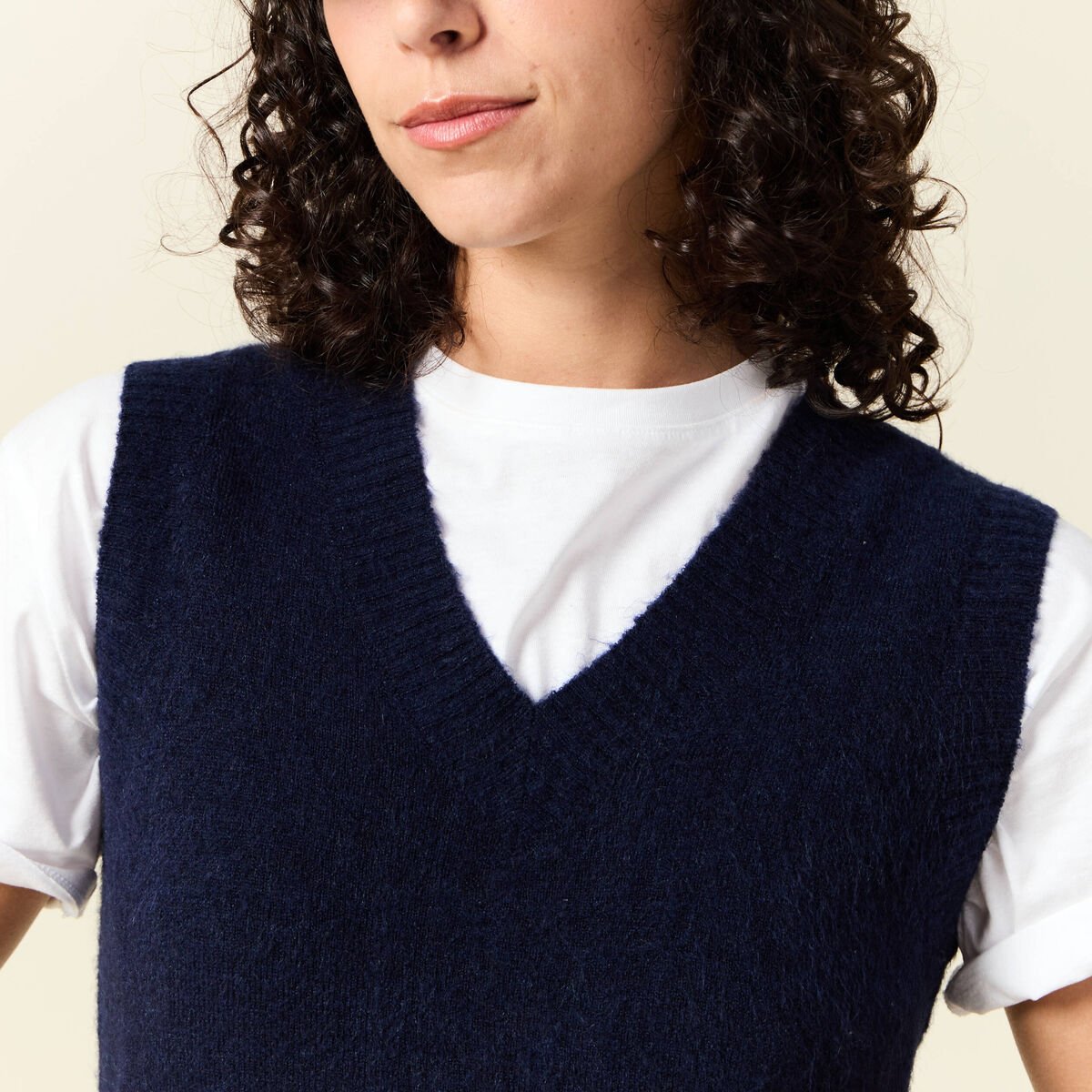 Pull sans manches col en V bleu marine femme