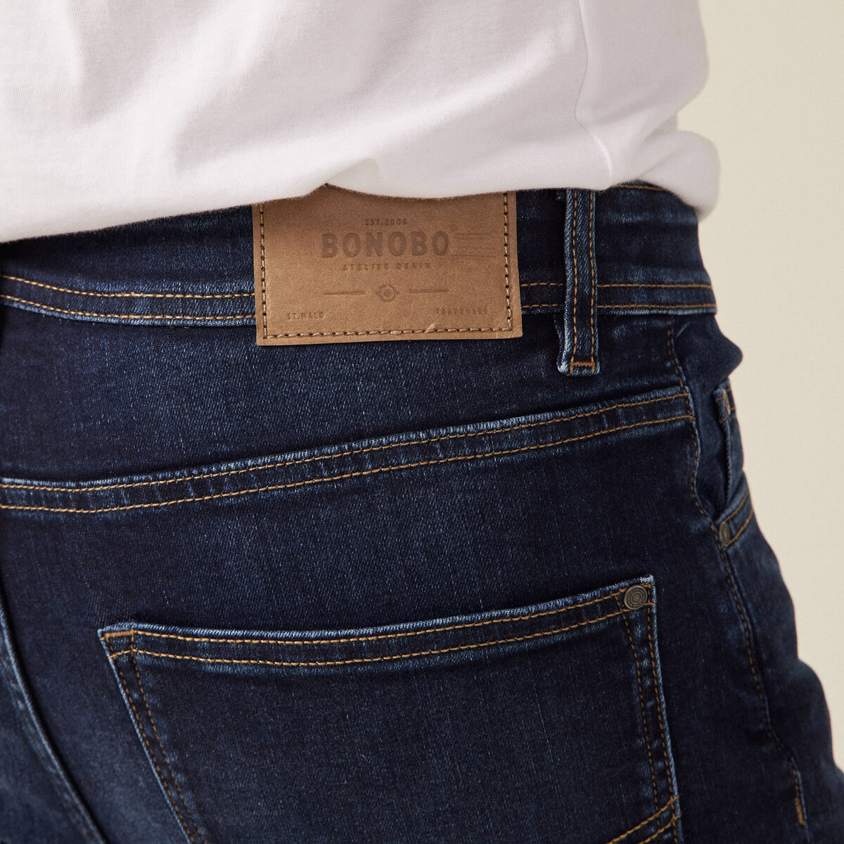 Jeans tapered 5 poches denim brut homme