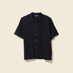 Polo en maille noir femme