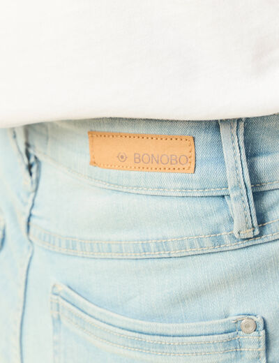 Jeans slim taille haute denim bleach femme