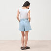 Short taille haute en jeans denim bleach femme