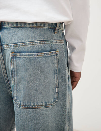 Jeans loose longueur 32 en coton denim dirty homme