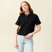Polo en maille noir femme