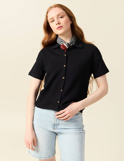 Polo en maille noir femme