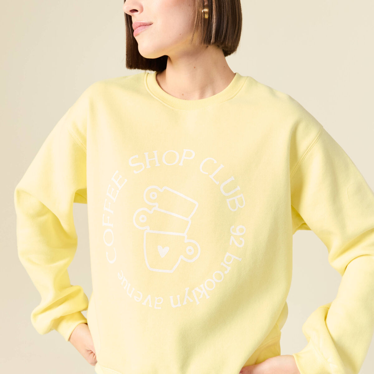 Sweat droit court manches longues jaune pastel femme