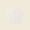 Polo en maille creme femme