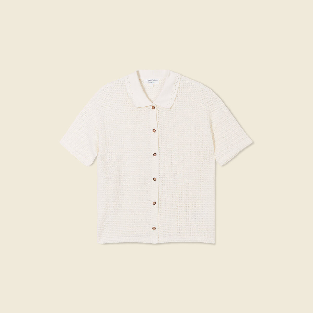 Polo en maille creme femme