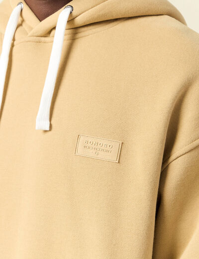 Sweat à capuche doublée beige homme