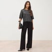 Pull manches courtes col rond brillant noir femme