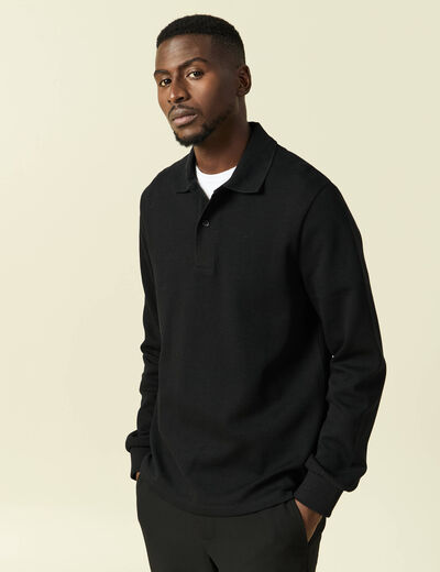 Polo cintr&eacute; manches longues en coton noir homme