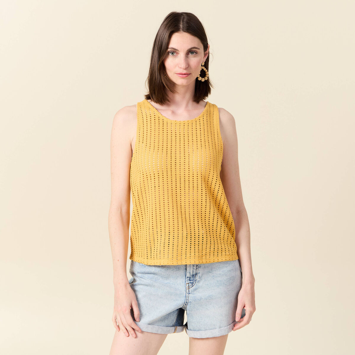 Débardeur sans manches ajouré jaune femme