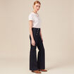 Jeans flare à pont denim brut femme
