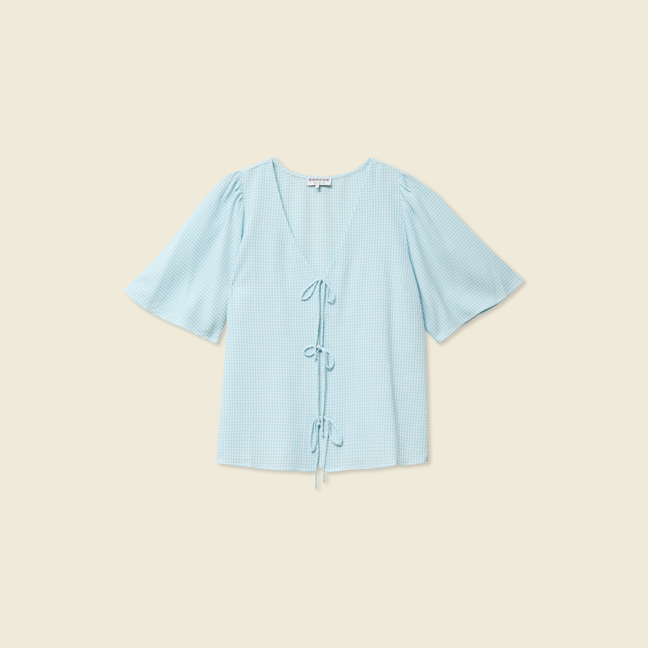 Blouse manches courtes nou&eacute;e bleu pastel femme