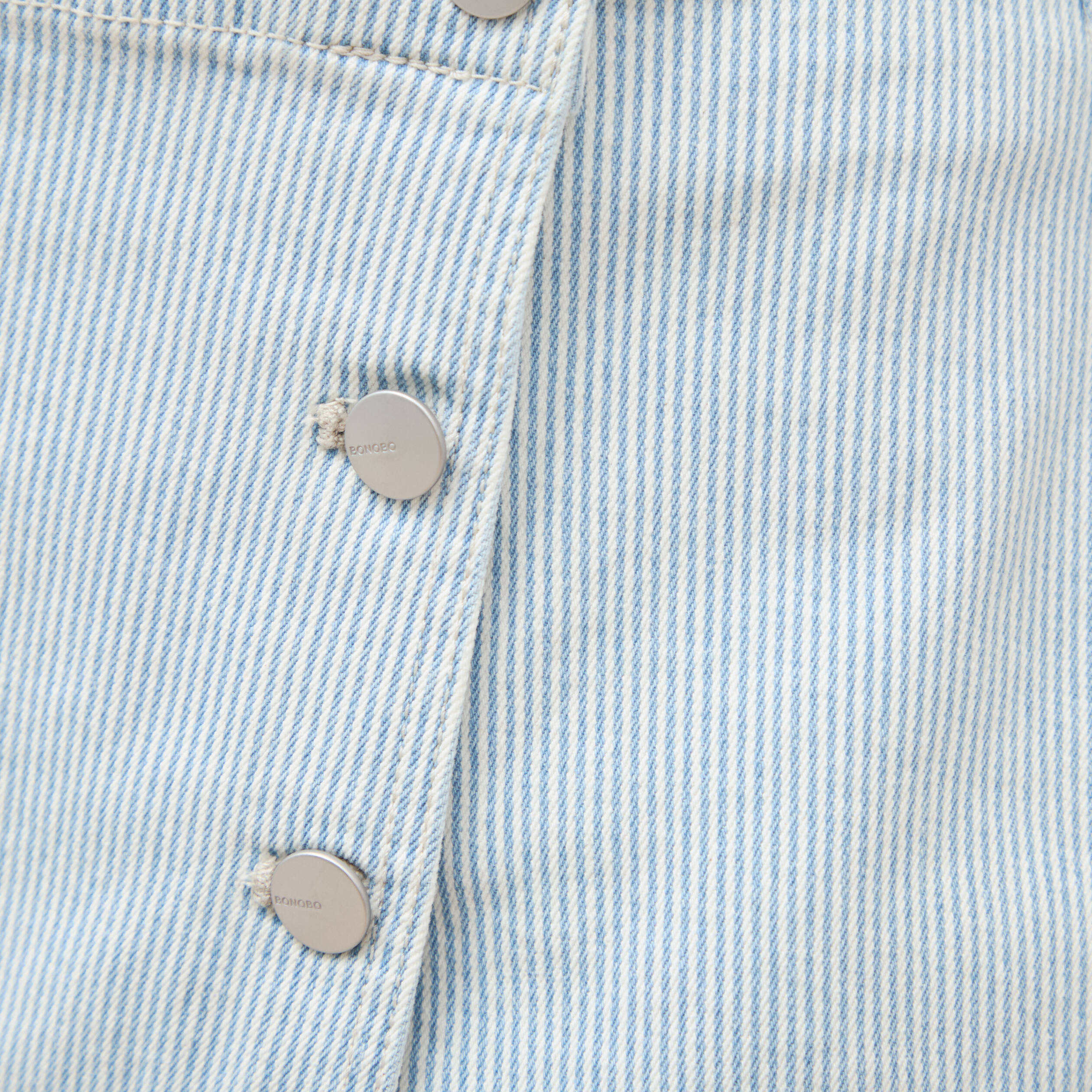 Jupe-short taille haute en jeans denim bleach femme