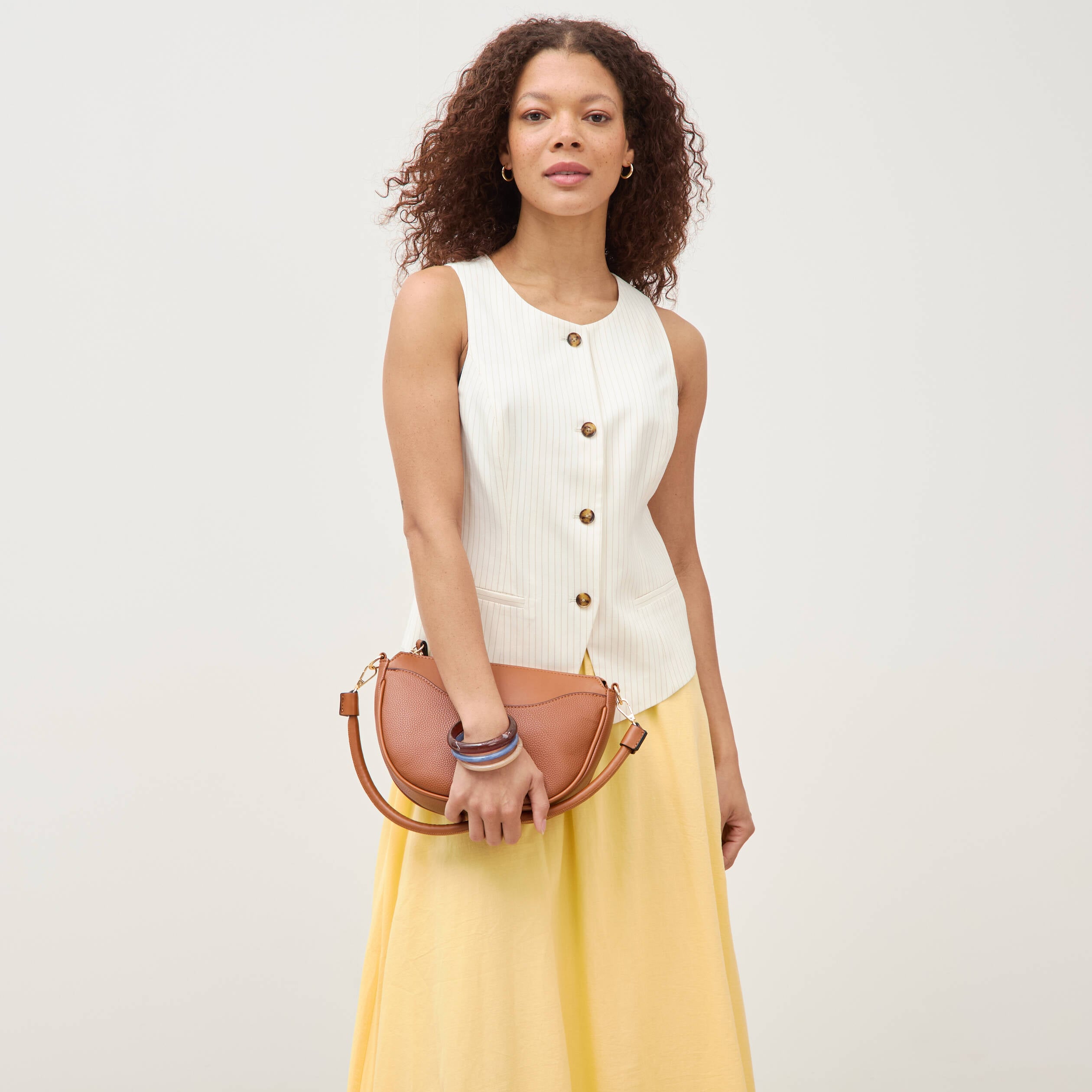 Gilet sans manches col rond doubl&eacute; ivoire femme