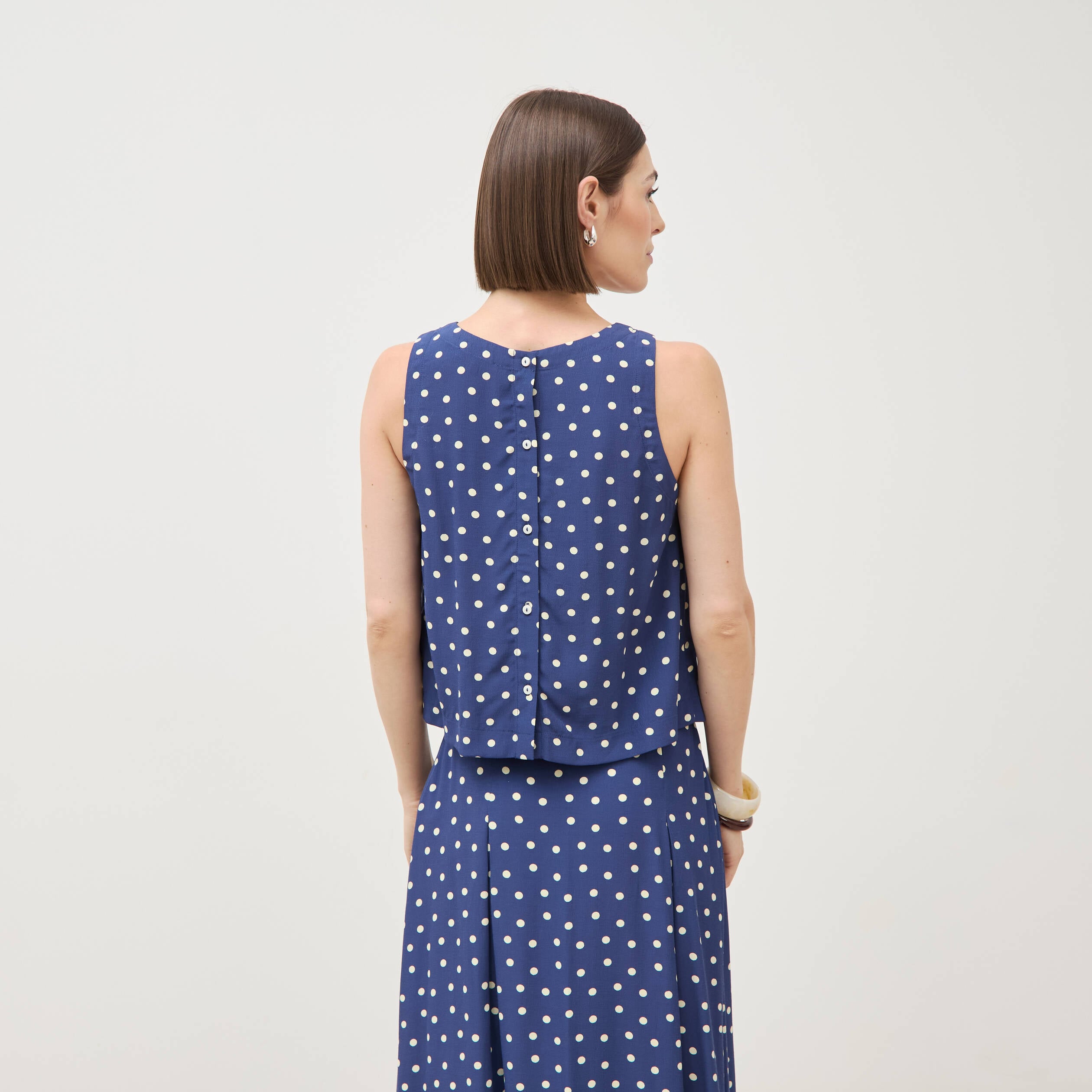 Top sans manches bleu marine femme