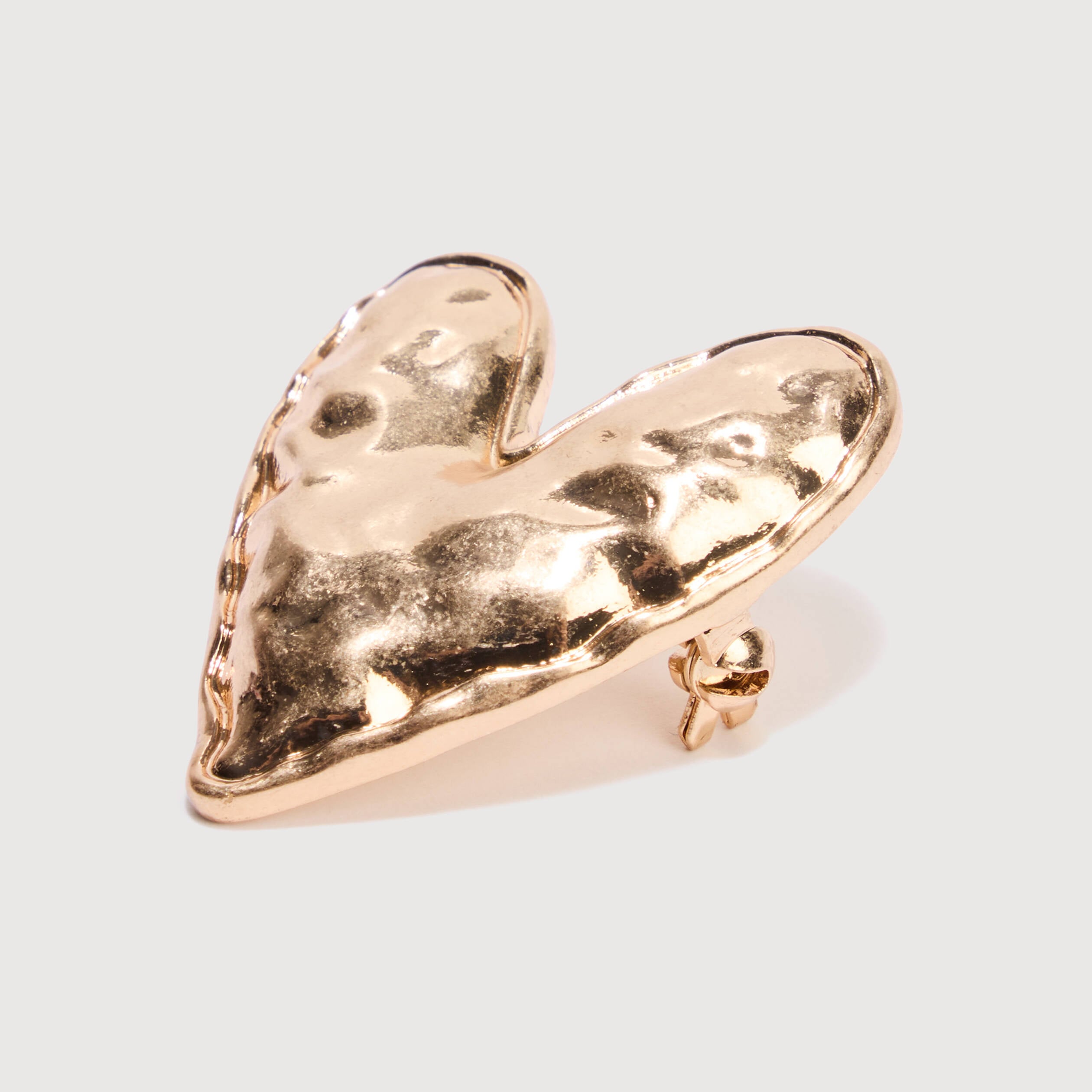 Broche couleur or femme