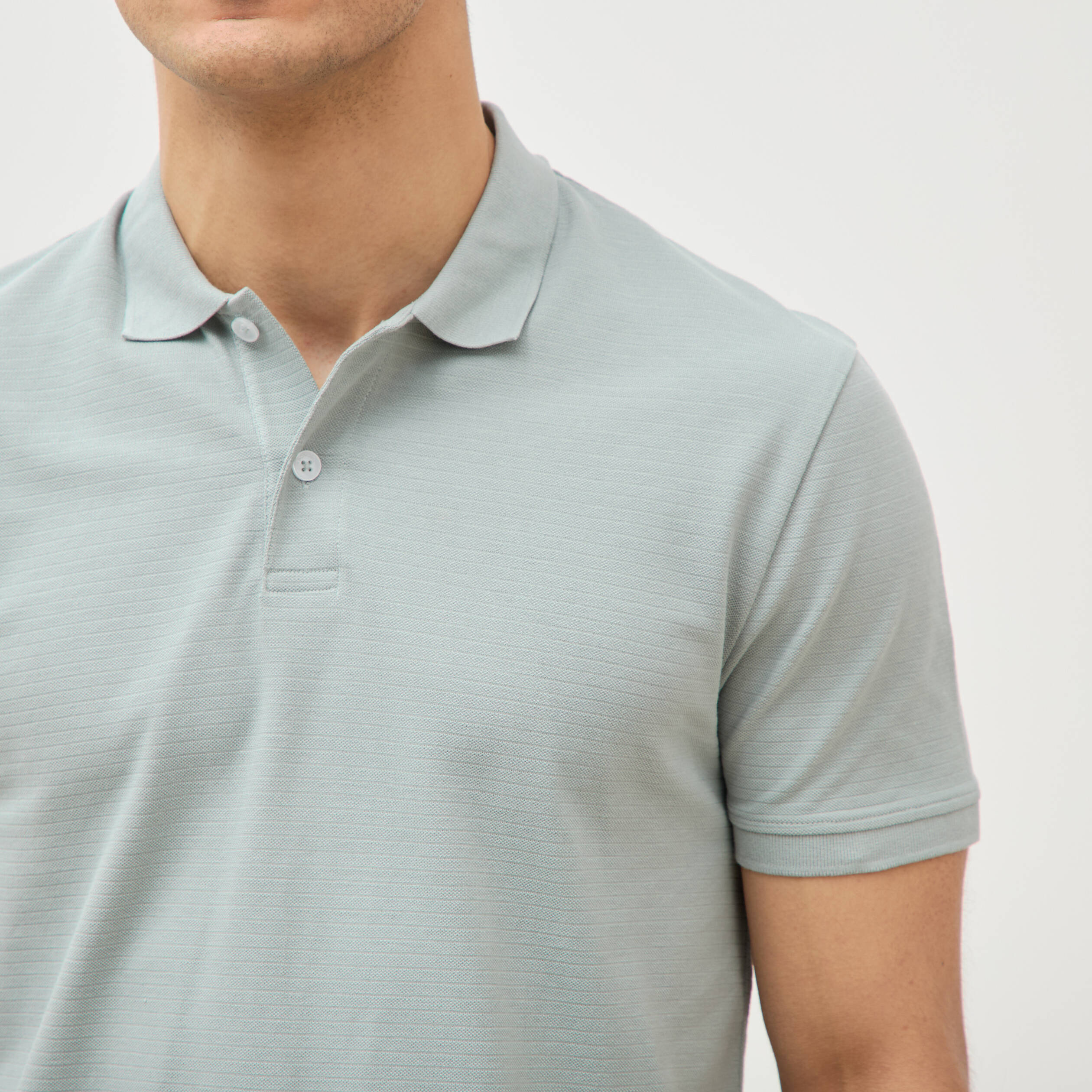 Polo cintr&eacute; en coton manches courtes vert clair homme