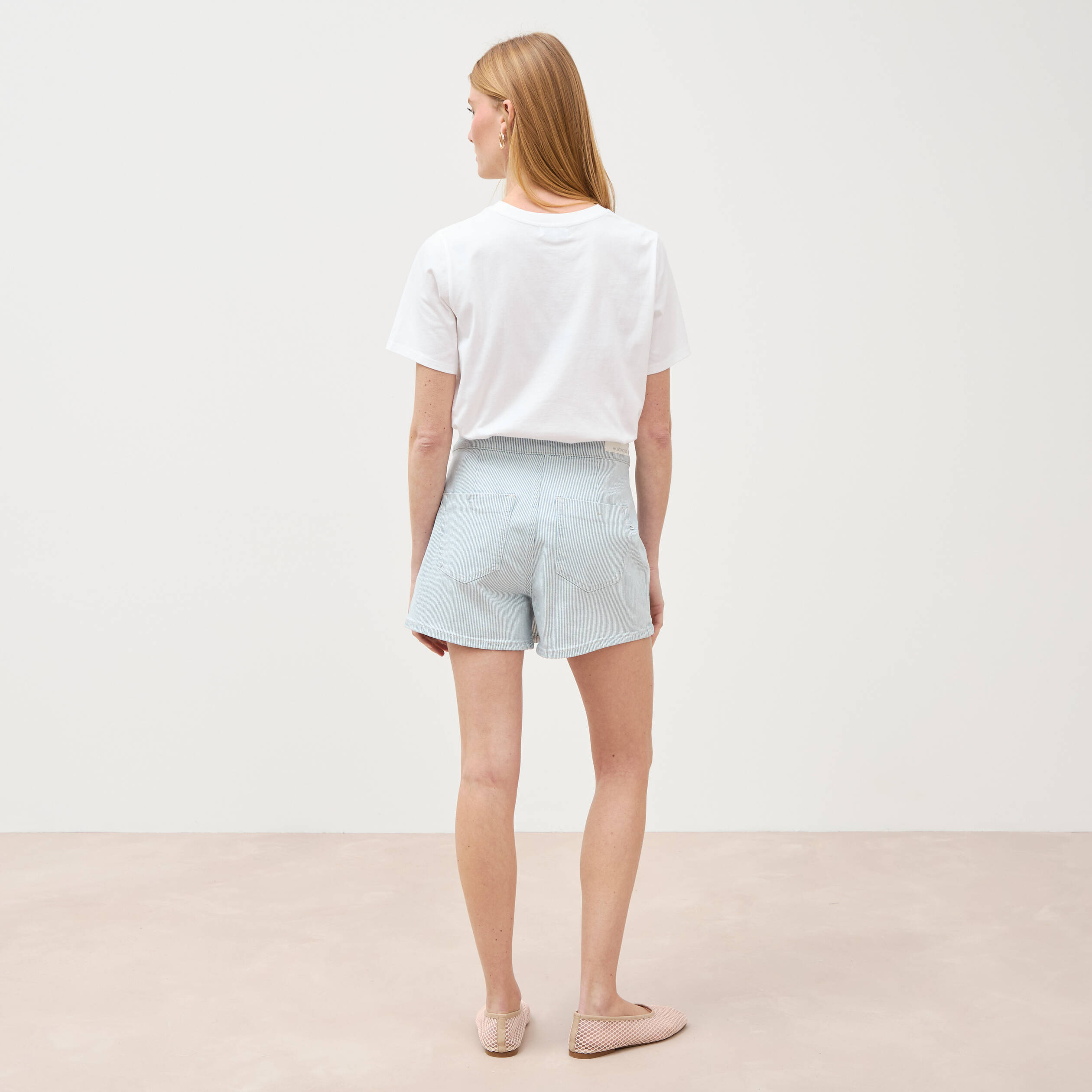 Jupe-short taille haute en jeans denim bleach femme